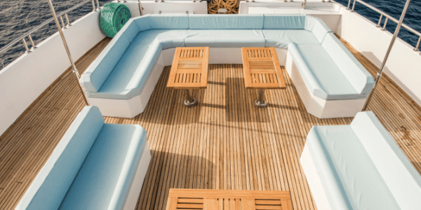 View of yacht teak deck at bow of vessel