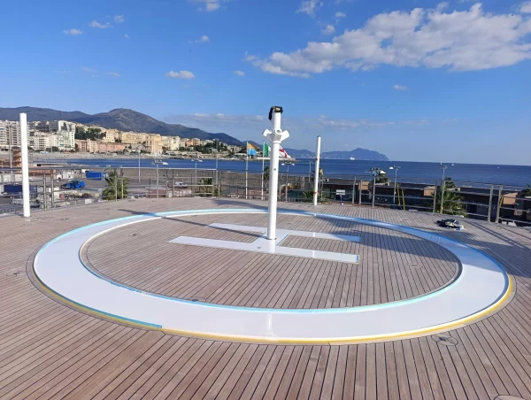 A yacht helideck with resin on the letter and ring.